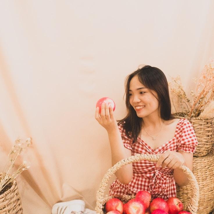 Aria Sharma, Lead Design Curator at Astra Lumi Venta, reviewing corporate floral arrangements